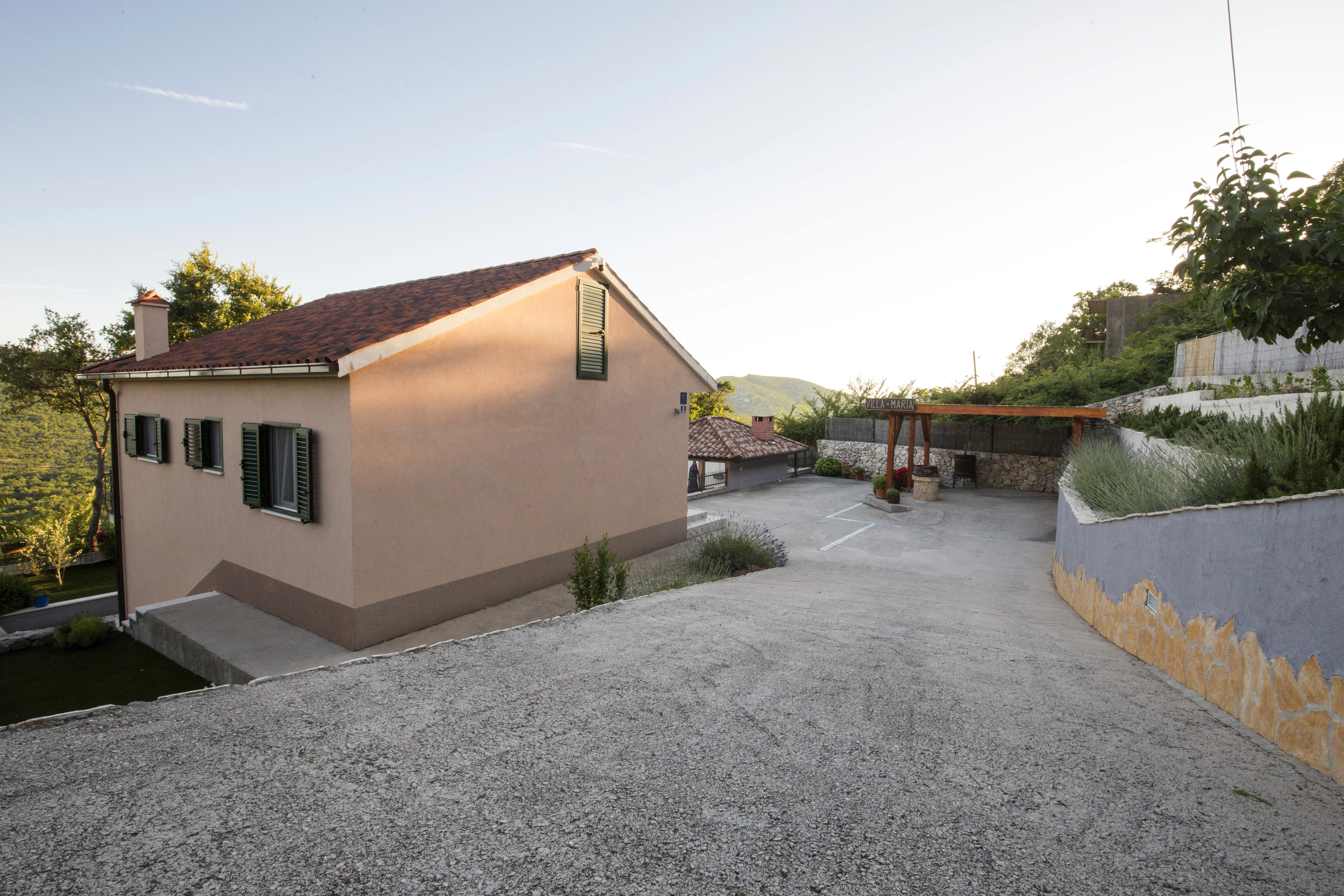 Villa facade and private parking