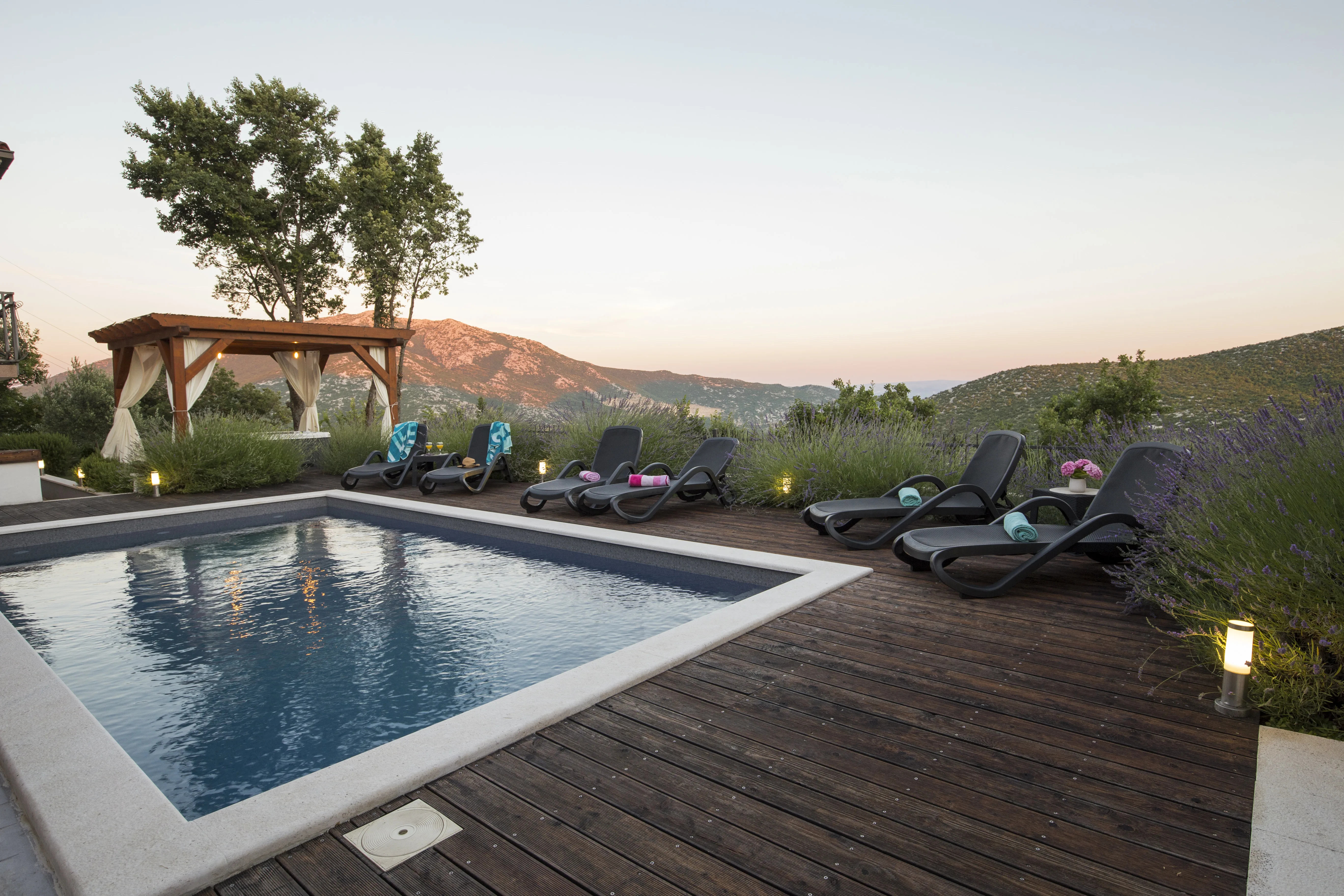 Pool terrace with lavender at sunset